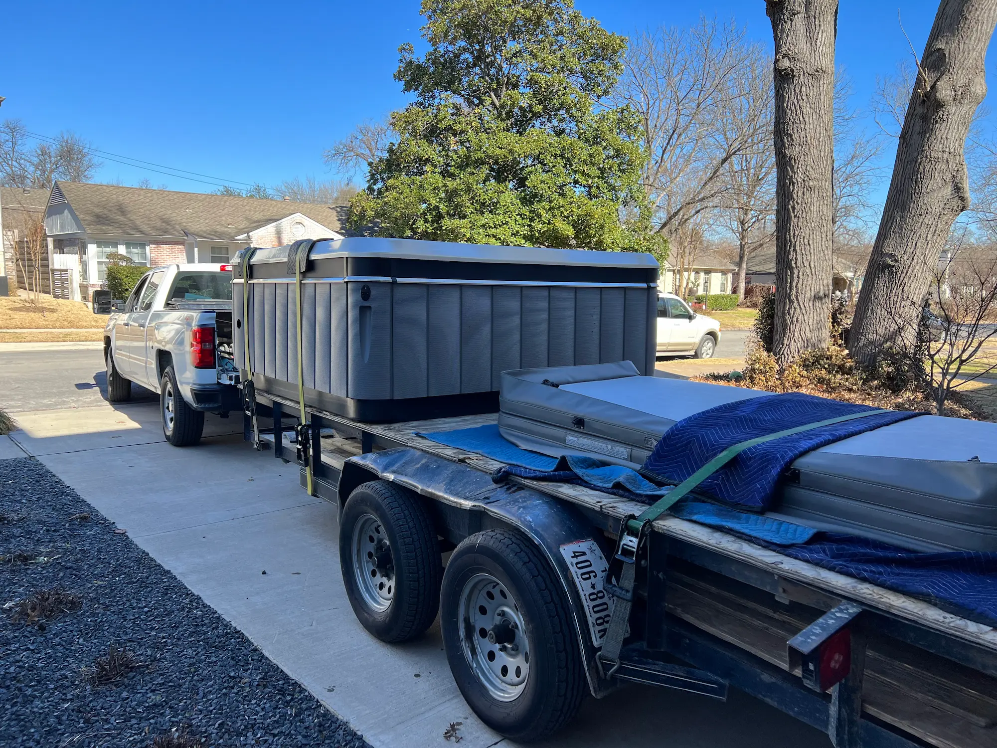 TNT Spa Movers truck with hot tub